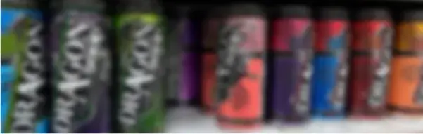 The Presentation of Alcohol and E-Liquid blurred photo of alcohol on a shelf